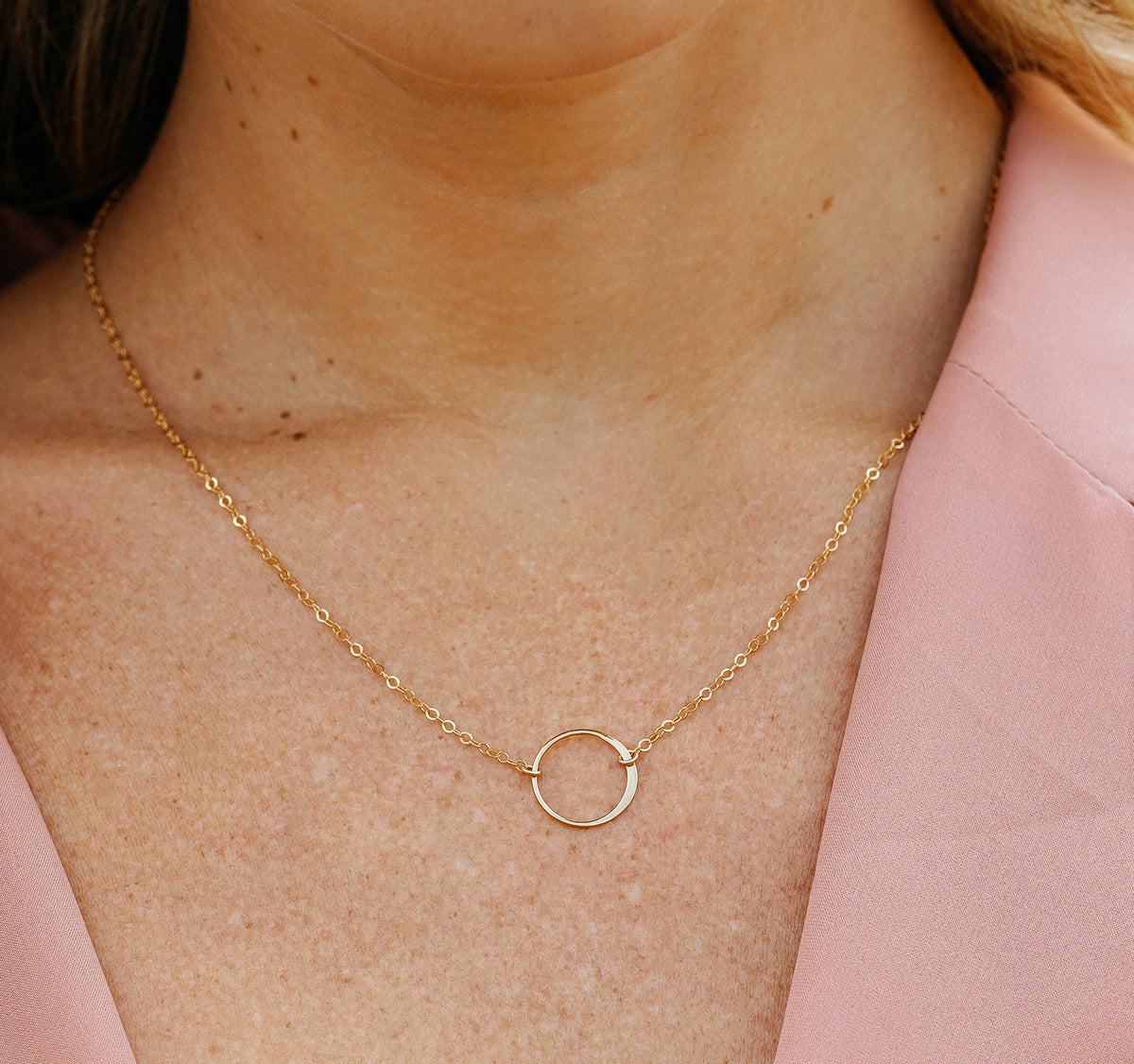 Gold karma online circle necklace